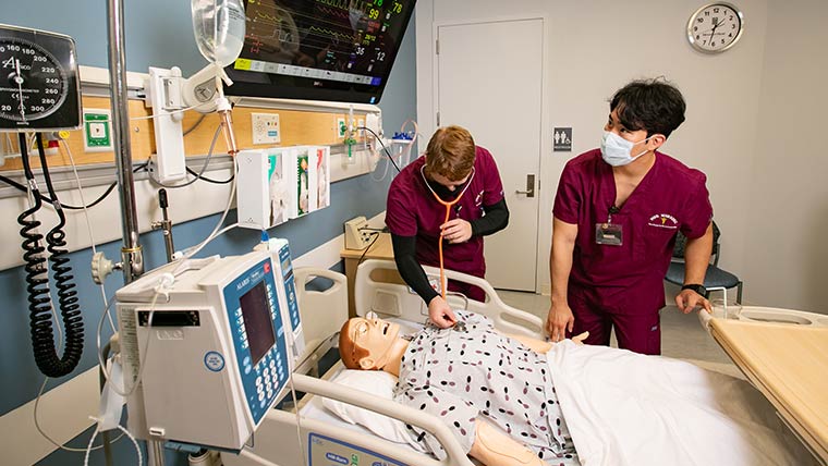Missouri State nursing students getting hands-on training within a clinical setting. 